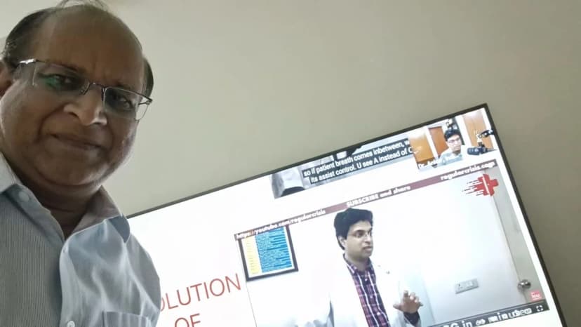 Dr. P K Jain candidly watching